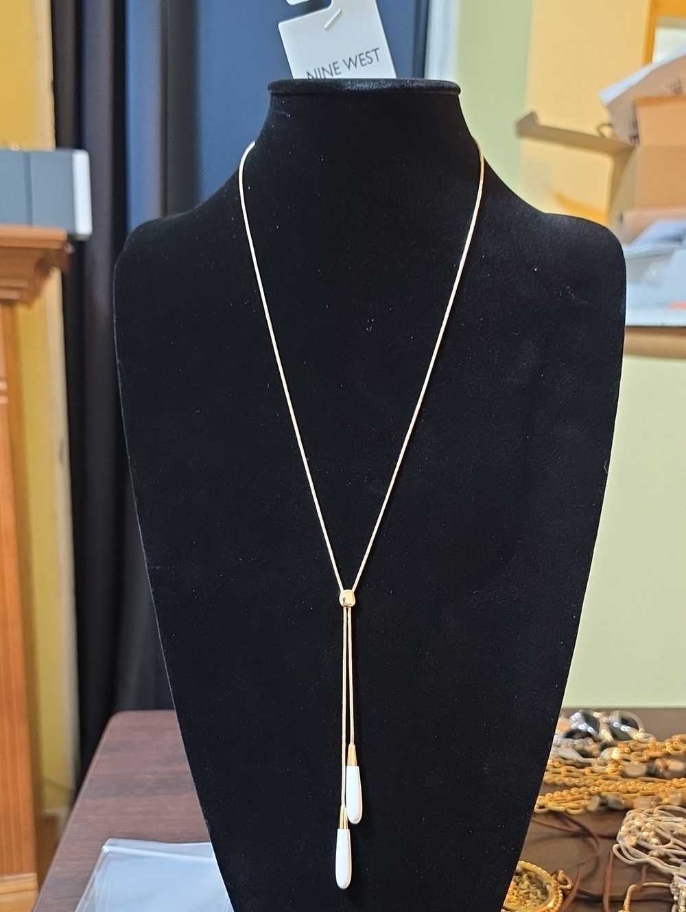 A195- Nine West Gold Long Lariat Necklace with White Teardrop Drops